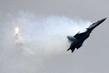 A Royal Thai Air Force (RTAF) SAAB JAS 39 Gripen fighter aircraft performs an aerial display during a media preview for the Singapore Airshow in Singapore on February 4, 2018. (Source: Getty Images)