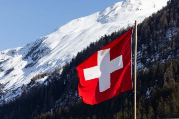 A Swiss national flag ahead of the World Economic Forum (WEF) annual meeting in Davos, Switzerland. (Source: Getty Images) A Swiss national flag ahead of the World Economic Forum (WEF) annual meeting in Davos, Switzerland. (Source: Getty Images)