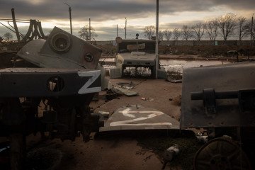 Destroyed Russian military vehicles at a former base near Kherson International Airport following the withdrawal of Russian forces, November 19, 2022. (Source: Getty Images)