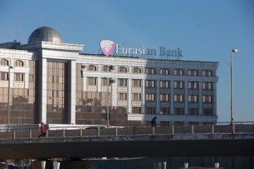 Kazakh Central Bank Plans $300 Million Currency Release From National Fund The offices of Eurasian Bank JSC stand in Astana, Kazakhstan. (Source: Getty Images)