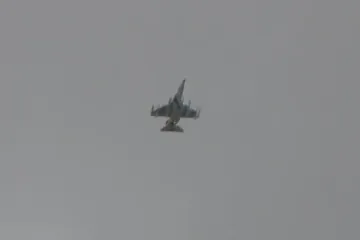 An Iranian Air Force fighter jet flies over Tehran during reported aerial patrols. (Source: Babak Taghvaee) An Iranian Air Force fighter jet flies over Tehran during reported aerial patrols. (Source: Babak Taghvaee)