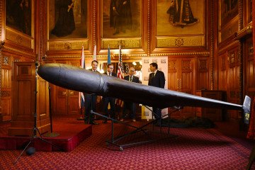 A downed Iranian-made Shahed-136 drone used by Russia in Ukraine on display at the UK Parliament in London, October 14, 2025. (Source: Getty Images)