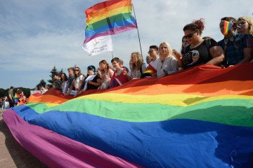 People wave gay rights' movement rainbow flags during the gay pride rally in Saint Petersburg, on Agust 12, 2017. (Source: Getty Images) People wave gay rights' movement rainbow flags during the gay pride rally in Saint Petersburg, on Agust 12, 2017. (Source: Getty Images)