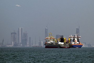 Commercial vessels are pictured offshore in Dubai on March 11, 2026. (Source: Getty Images)