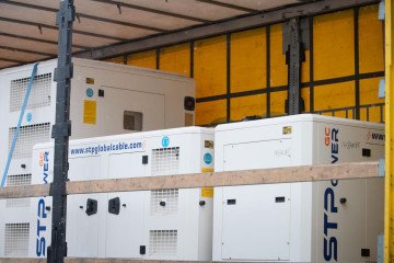 Generators provided as humanitarian aid are unloaded for delivery to medical facilities in Kyiv, Ukraine. (Source: Ukrainian Ministry of Energy)