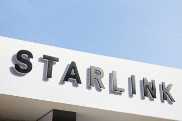 The Starlink corporate logo, part of the SpaceX ecosystem. (Source: Getty Images)