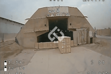 Screenshot from a video released by the Iran-backed Iraqi militia Kataib Hezbollah showing an FPV drone approaching a hardened structure at the US Victory Base complex near Baghdad International Airport. (Source:  Al Jazeera)