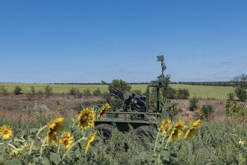 Ukrainian soldiers train with armed ground robots at an undisclosed location in the Donetsk region, Ukraine, on September 3, 2025.