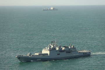 Royal Navy RFA Tideforce and a Wildcat helicopter (not pictured) shadow a Russian frigate Admiral Grigorovich (front) in the Channel, April 2026. (Source: Royal Navy)
