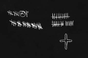 Scratched graffitis on the walls of Kherson's torture chambers. (United24 Media)