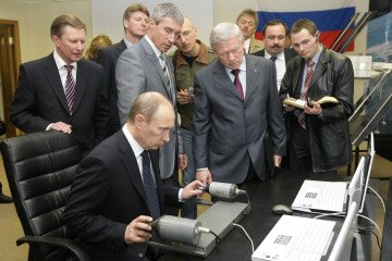 Russia’s leader Vladimir Putin (2nd L) visits the Gagarin Cosmonaut Training Research Centre in Star City outside Moscow, April 6, 2010. (Source: Getty Images)