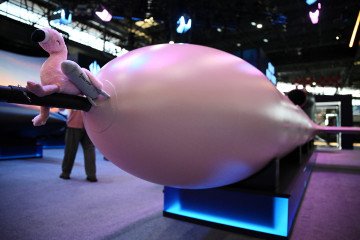 This photograph shows a stuffed pink flamingo perched on an FP-5 Flamingo cruise missile in Paris on June 16, 2026.