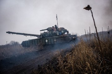 Ukrainian servicemen from 93 brigade drive a battle tank to its position as the Russian-Ukrainian war continues in the direction of Pokrovsk, Ukraine, on December 23, 2024. (Source: Getty Images)