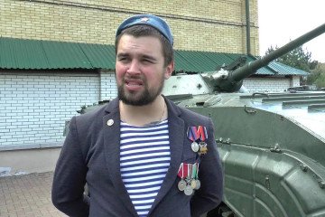 Russian pro-war military blogger Egor Guzenko, known as “Thirteenth,” stands in front of a military armored vehicle. (Source: Social Media) Russian pro-war military blogger Egor Guzenko, known as “Thirteenth,” stands in front of a military armored vehicle. (Source: Social Media)