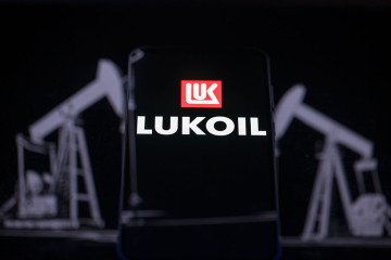 The Lukoil logo appears on a smartphone screen in this photo illustration. (Source: Getty Images) The Lukoil logo appears on a smartphone screen in this photo illustration. (Source: Getty Images)