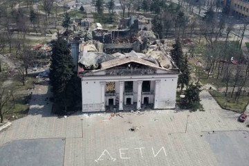 The Mariupol Drama Theater following its destruction during a Russian airstrike on March 16, 2022, with the word “CHILDREN” written in Russian in large letters outside the building. (Source: Dmytro Lubinets/Facebook)