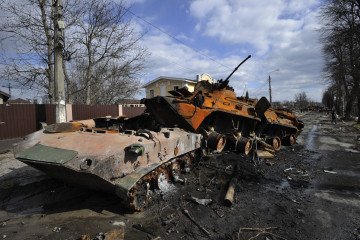 Destroyed Russian military vehicles line a street in Bucha, Ukraine, April 4, 2022, following the withdrawal of Russian troops from the area. (Photo: Getty Images)