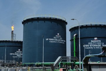 A flare stack and water collection tanks at the Dangote Petroleum Refinery and Petrochemicals FZE plant in Ibeju Lekki, Lagos, Nigeria, on October 12, 2026. (Source: Getty Images)