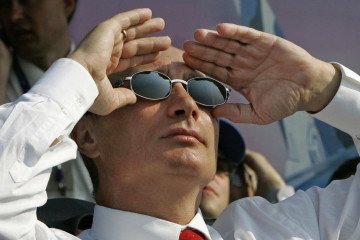 Russian leader Vladimir Putin watches an airshow during an opening ceremony of the International Aviation and Space salon “MAKS-2007” in Zhukovsky airfield, outside Moscow, 21 August 2007. (Source: Getty Images) Russian leader Vladimir Putin watches an airshow during an opening ceremony of the International Aviation and Space salon “MAKS-2007” in Zhukovsky airfield, outside Moscow, 21 August 2007. (Source: Getty Images)