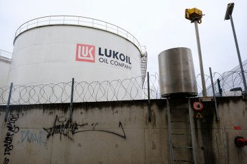 The PJSC Lukoil Oil Company tank storage of Neder-Over-Heembeek are seen on November 15, 2025 in Brussels, Belgium. (Source: Getty Images)