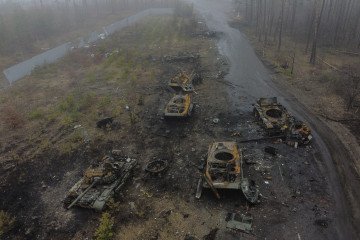 An aerial picture shows burned Russian armoured vehicles on the outskirts of Kyiv, on April 1, 2022, amid the Russian invasion of Ukraine. (Source: Getty Images)