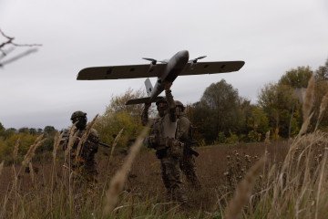Ukrainian soldiers prepare an “Evanger” UAV for launch during operations in Kharkiv region, September 24, 2025. (Source: Getty Images)