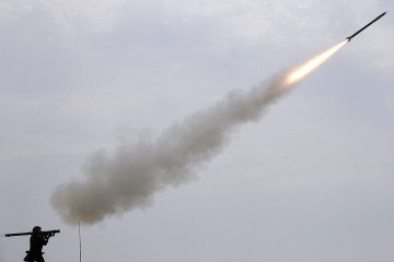 A Russian soldier fires a portable air defense rocket. (Source: Getty Images)