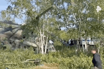 A crashed Russian Mi-8 helicopter lies wrecked in a roadside ditch on Sakhalin Island after reportedly running out of fuel. (Source: Russian media) A crashed Russian Mi-8 helicopter lies wrecked in a roadside ditch on Sakhalin Island after reportedly running out of fuel. (Source: Russian media)