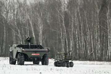 Illustrative image. PIAP HUNTER, a heavy unmanned ground vehicle, alongside a smaller autonomous robot at the Military Institute of Armament Technology training ground in Zielonka, Masovian Voivodeship, Poland, on February 19, 2026. Illustrative image. PIAP HUNTER, a heavy unmanned ground vehicle, alongside a smaller autonomous robot at the Military Institute of Armament Technology training ground in Zielonka, Masovian Voivodeship, Poland, on February 19, 2026.