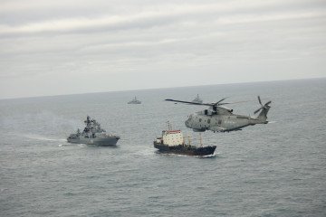 UK Wildcat helicopter from 815 Naval Air Squadron with other UK warships shadows Russian Udaloy-class destroyer Severomorsk nd its accompanying oiler, April 9, 2026. (Source: Royal Navy)