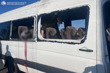 The shrapnel-damaged body and shattered windows of a passenger bus targeted by a Russian drone in Nikopol district. (Source: Dnipropetrovsk Regional Military Administration)