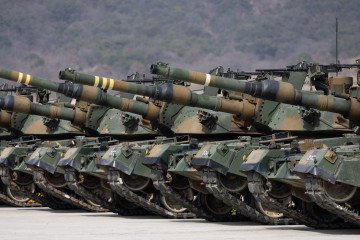 South Korean army K1A1 tanks, manufactured by Hyundai Rotem Co., during a joint live-fire exercise with the US Army at Rodriguez Range in Pocheon, South Korea, on Wednesday, March 22, 2023. South Korean army K1A1 tanks, manufactured by Hyundai Rotem Co., during a joint live-fire exercise with the US Army at Rodriguez Range in Pocheon, South Korea, on Wednesday, March 22, 2023.
