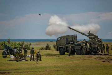 Philippine troops fire an ATMOS 155mm howitzer during a counter landing live fire exercise at a beach as part of US-Philippines joint military exercises on May 03, 2025 in Aparri, Cagayan province, Philippines. (Source: Getty Images)