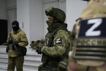 Civilians and volunteers receive shooting training by members of the Russian army, special forces, and security forces in Rostov, Russia, on December 6, 2022.