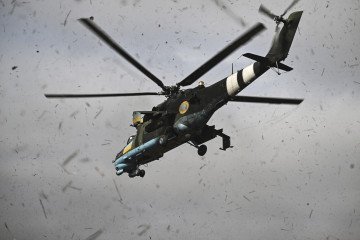 A Mi-24 fighting helicopter takes off for a mission against Russian targets on March 26, 2023.