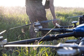 A Ukrainian soldier of the 127th Heavy Mechanized Brigade prepares a Heavy Shot UAV for launch. (Source: Getty Images)