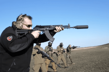 Battlestate CEO Nikita Buyanov posing with members of 715 Team, location unknown, 2022. (Source: Reddit/Suibeam)