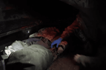 A Ukrainian medic reaches into the MAUL ground robot’s armored capsule to begin stabilizing a wounded soldier immediately after evacuation. (Source: First Separate Medical Battalion) A Ukrainian medic reaches into the MAUL ground robot’s armored capsule to begin stabilizing a wounded soldier immediately after evacuation. (Source: First Separate Medical Battalion)