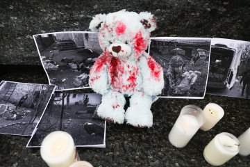 A silent protest at the Main Square against the mass murder of Ukrainian civilians by the Russian soldiers during the ongoing invasion of Ukraine. Krakow, Poland on April 9, 2022. (Source: Getty Images)