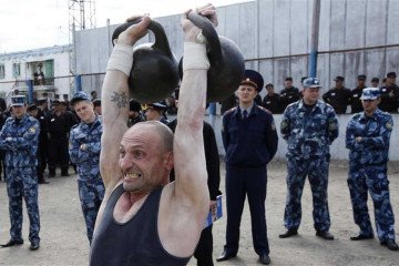 Russian prisoners at a correctional facility during a physical training session. Russian prisoners at a correctional facility during a physical training session.