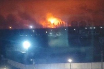 A fire is seen at the Nevinnomysskiy Azot after a drone strike, December 4, 2025. (Source: Exilenova+)