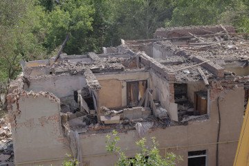 An apartment building remains partially destroyed by Russian bombing on June 20, 2026 in Kharkiv, Ukraine. (Source: Getty Images)