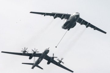 A Tupolev Tu-142 maritime reconnaissance and anti-submarine warfare aircraft and an Ilyushin Il-78 aerial refuelling tanker take part in a rehearsal of the military parade.