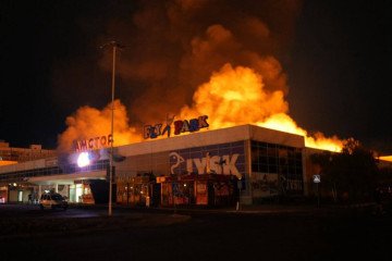 A fire engulfs a shopping center housing a JYSK store in Zaporizhzhia after a Russian attack on September 23, 2026. It was the fifth JYSK store destroyed by Russian strikes in Ukraine within a month.