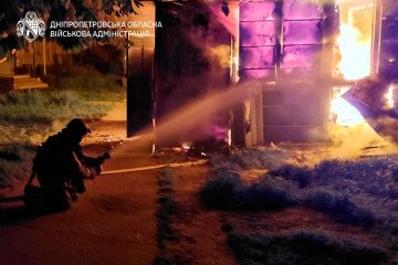 Firefighters extinguish a blaze following a Russian overnight strike in the Dnipropetrovsk region on May 9, 2026. (Source: Dnipropetrovsk Regional Military Administration)