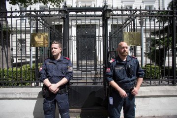 Austrian police stand guard in front of the Russian embassy during a protest of members and supporters of the Chechen community on July 7, 2020 in Vienna, Austria. (Source: Getty Images)
