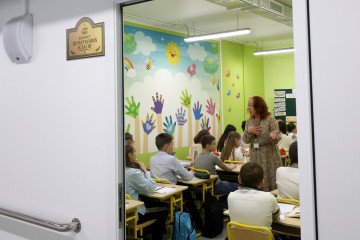 A teacher gives a lesson at a newly opened underground school in the Slobidskyi district of Kharkiv, Ukraine, on May 4, 2026. (Source: Getty Images)