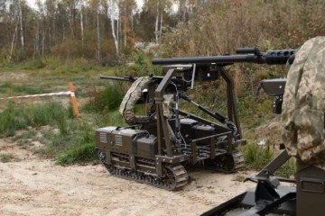Ground-based robotic system equipped with a 12.7 mm machine gun, used by Ukrainian forces to hold a frontline position without infantry. (Source: devDroid / Youtube)