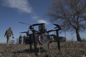 Soldiers from the 93rd Brigade's drone unit test fiber optic drones before using them on the front line. (Source: Getty Images)