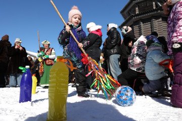 People attend a celebration of Maslenitsa (Pancake Week) at the fortress city of Yablonov, Belgorod Region, Russia on February 22, 2026. (Source: Getty Images)